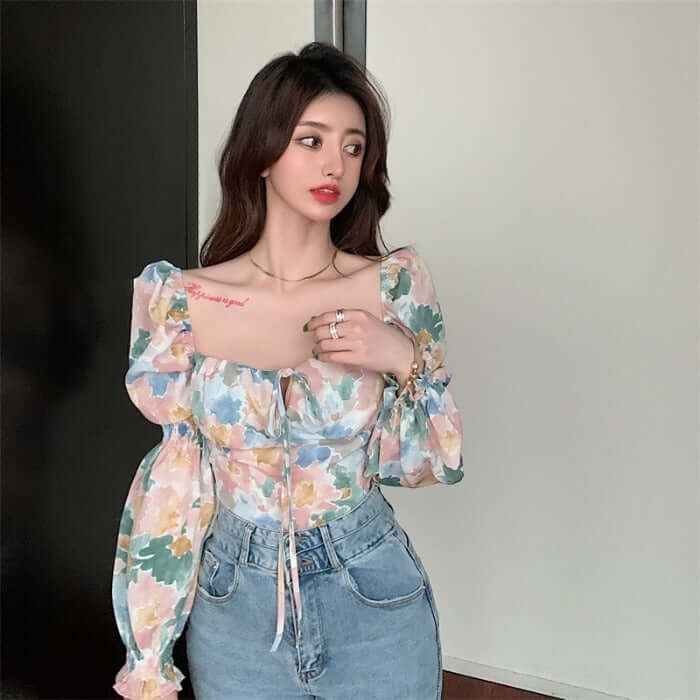Careful Machine Short Print Off Shoulder Open Collar Top Bow Tie Small Shirt Womens Wear modeled by a woman in floral design.