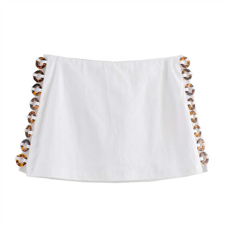 Accessories hanging neck short top, short skirt and pants set for women - stylish white skirt with patterned accents.