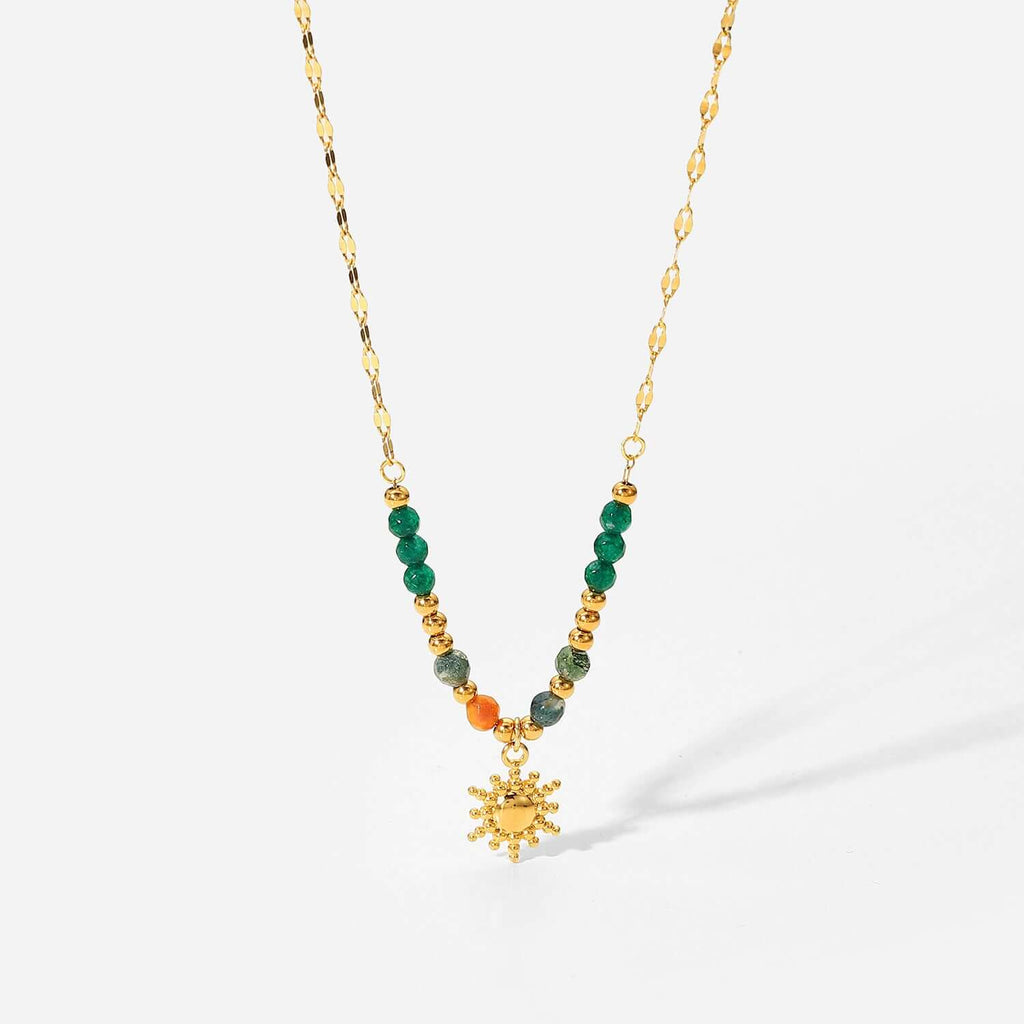 French fashion retro INS style necklace, sun pendant, accessories for women with green and gold details.