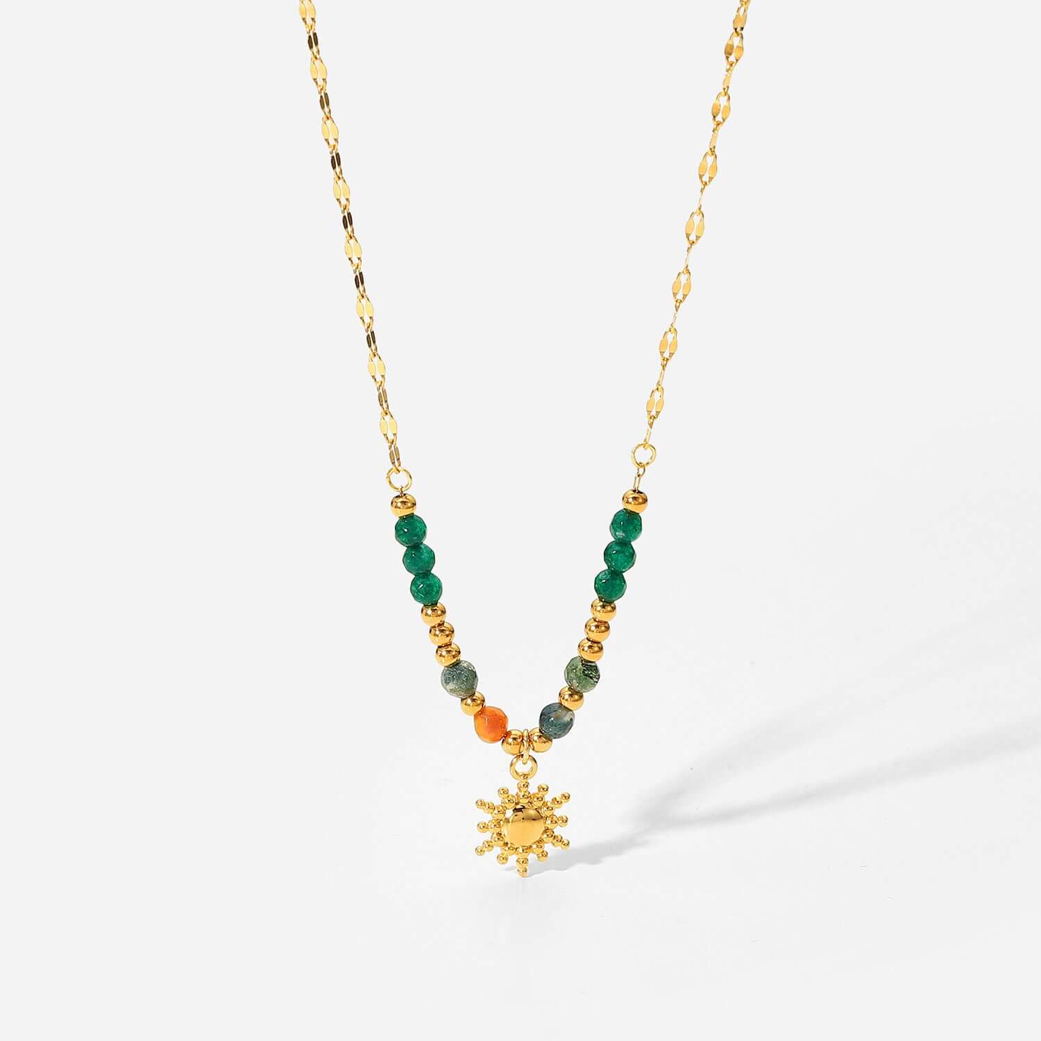 French fashion retro INS style necklace, sun pendant, accessories for women with green and gold details.